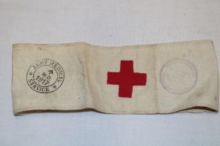 An original First War Army Medical Service Red Cross arm band dated 1917