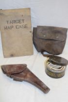 A First War Officer's brown leather revolver holster, tin of safety fuse lengths,