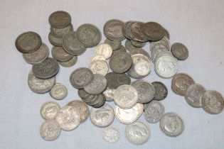 A selection of pre-1947 GB silver coins including eight half-crowns, twenty-nine florins,