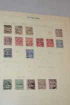 A folder album containing a collection of Switzerland stamps,