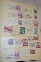 A folder album containing a collection of mainly Europe postmarks and cancels