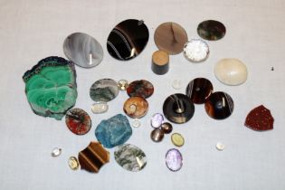 A selection of various semi-precious gemstones, pendants etc.
