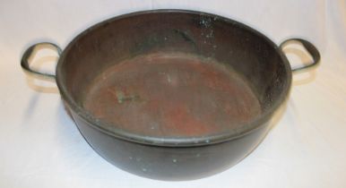 A 19th century copper circular two-handled preserve pan,