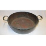 A 19th century copper circular two-handled preserve pan,