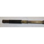 A brass two-draw telescope "The Comet" by Newbold & Bulford Limited London