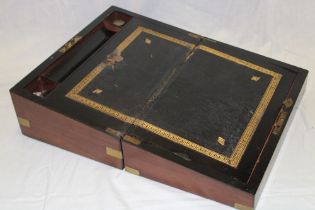 A Victorian brass mounted burr walnut rectangular writing slope with fitted interior,