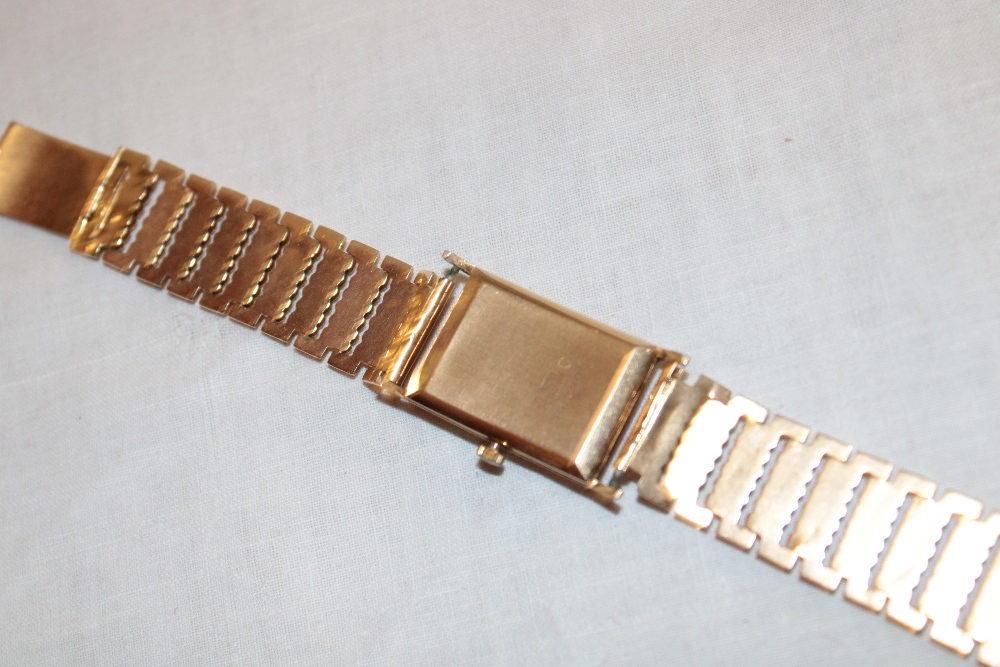 A gentleman's 18ct gold wristwatch by Urbex with silvered rectangular dial and 18ct gold strap - Image 3 of 3