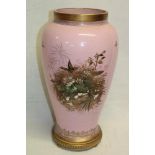 A large 19th Century French pink tinted opaque glass tapered vase with bird and floral decoration