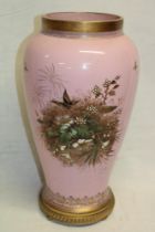 A large 19th Century French pink tinted opaque glass tapered vase with bird and floral decoration