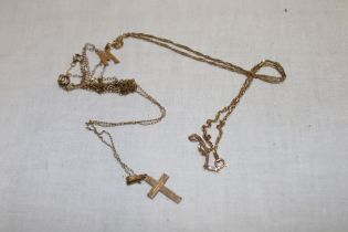 A 9ct gold crucifix with chain and one other