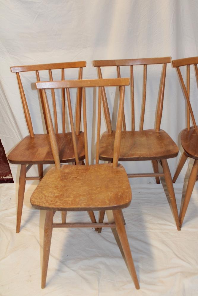 Three 1960's/70's Ercol pale elm dining chairs with crossed spindle-backs and shaped seats on - Image 3 of 4