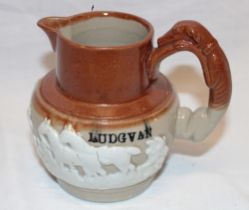 A 19th century Cornish stoneware harvest-style jug marked for "Ludgvan" with raised horse and