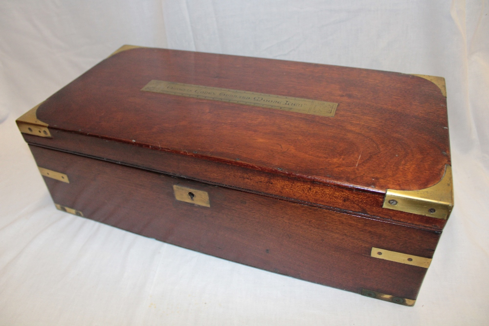 A 19th century brass mounted mahogany military writing slope with fitted interior,