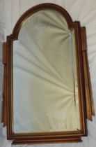 A good quality Art Deco-style bevelled arched wall mirror in painted angular frame,