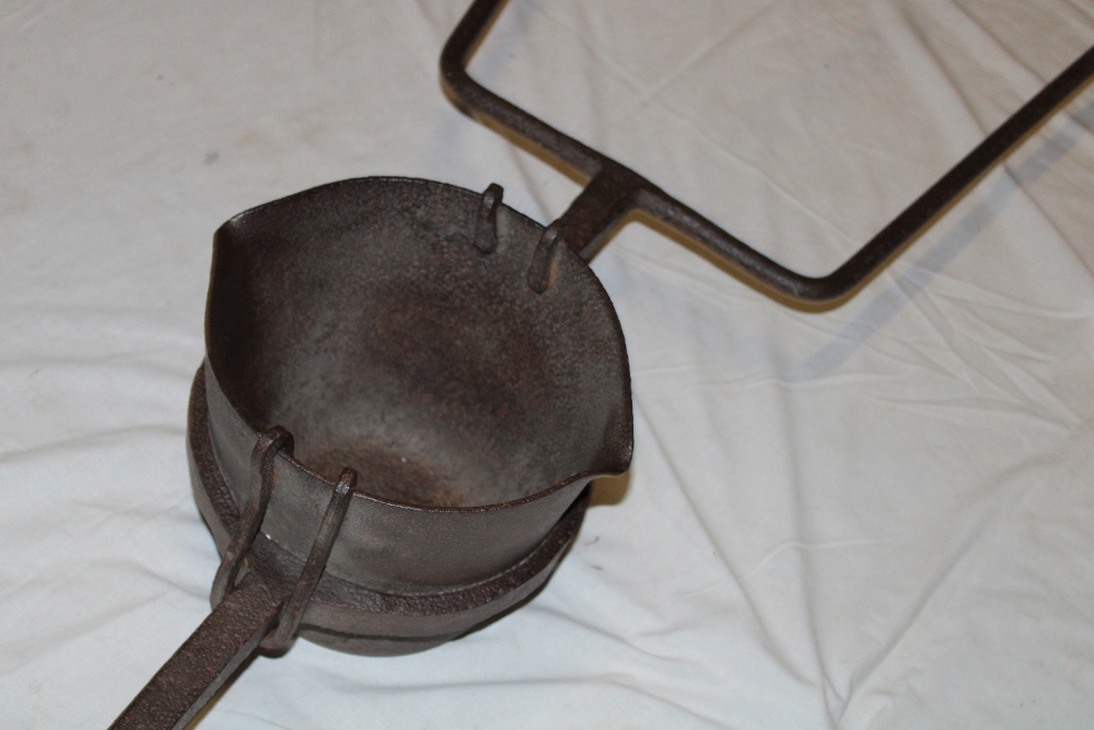 A large 19th century Cornish mining smelting iron pot with double pouring lips and iron frame, - Image 3 of 3