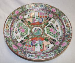 A 20th century Cantonese china circular charger with painted figure and floral decoration,