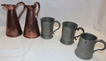 Two 19th century copper tapered jugs with loop handles and three various 19th century pewter pint
