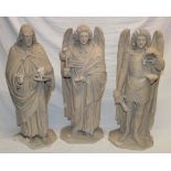 Three old plaster figures depicting religious characters,