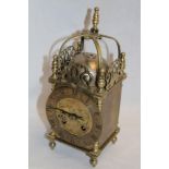 A 17th century-style brass lantern clock with French movement by Japy Freres in traditional case,