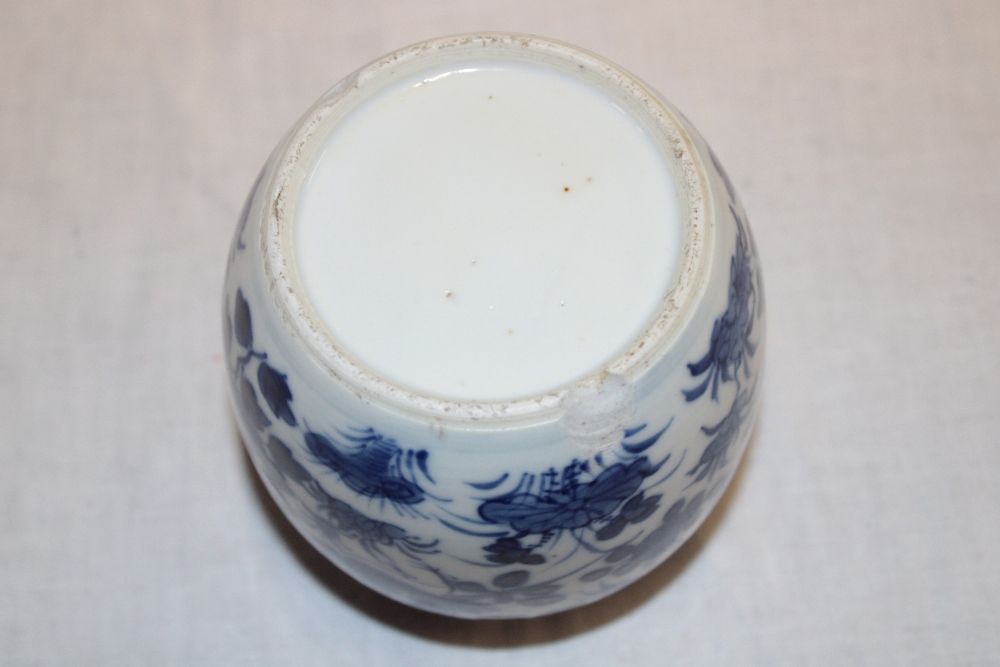 A 19th century Chinese circular ginger jar with blue and white bird and floral decoration, - Image 2 of 2