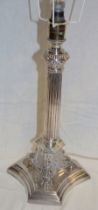 A George V silver table lamp in the form of a Corinthian column on trefoil base, 13" high,