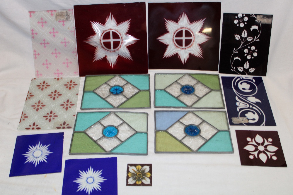 Four small stained leaded glass panels, 5½" x 7½"; a pair of ruby tinted glass star-cut panels,