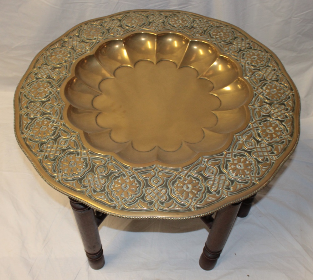 A large Indian brass top occasional table with recessed centre and floral decorated borders, - Image 2 of 2