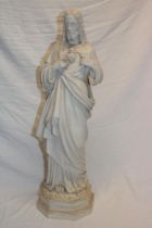 A large Parian-style china figure of Jesus marked "R & L" on octagonal base,
