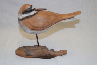 A Cornish carved wood figure of a sandpiper by Geoffrey Bickley of St.