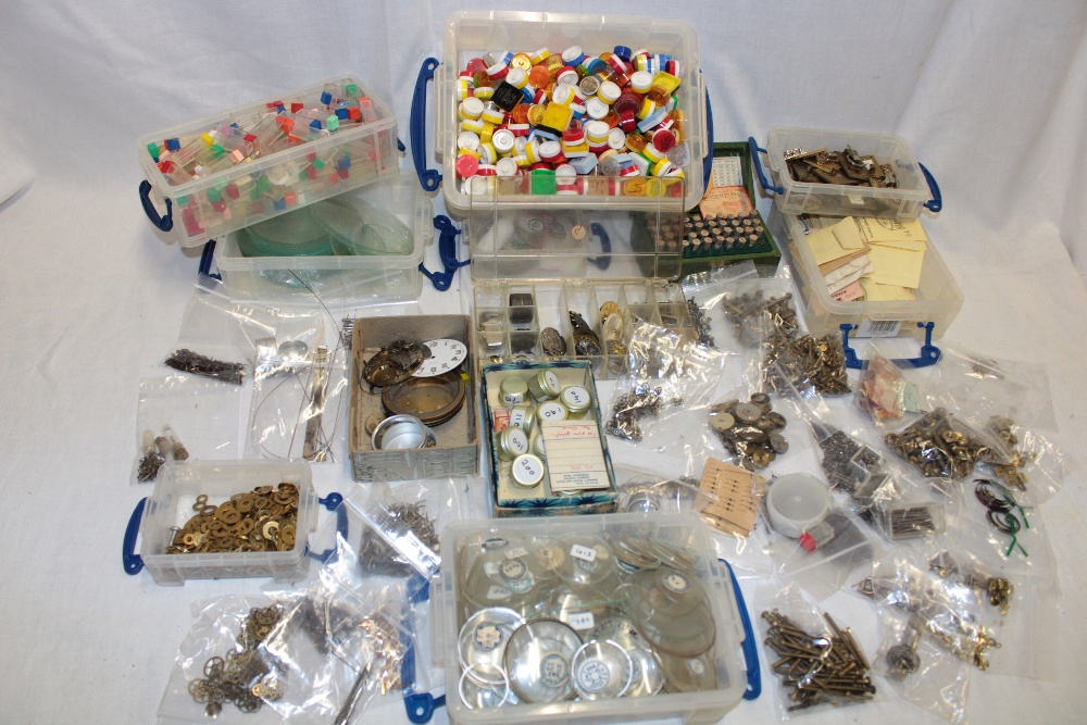 A selection of various watchmaker's tools, part pocket watches, part watch movements, springs,