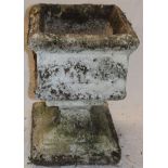 A weathered garden square-shaped pedestal urn with raised decoration on square base 22" high