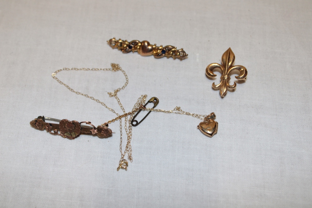 Two various 9ct gold mounted bar brooches, a fleur de lys brooch and a 9ct gold pendant necklace (8.