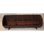 A 19th century Cornish farm cast-iron pig feeding trough with central bar dividers,