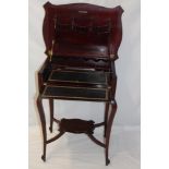 A late Victorian/Edwardian mahogany rectangular folding campaign-style desk with fitted interior