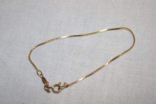 A 9ct gold flat-link bracelet (1.