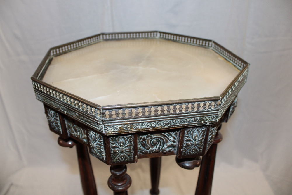 An unusual brass mounted mahogany octagonal occasional table with inset marble top and brass - Image 2 of 3