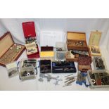 A selection of various watchmaker's and jeweller's tools and accessories including collets,
