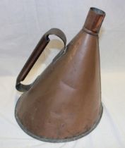 An unusual old copper conical-shaped flask with loop handle,