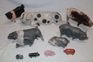 A studio pottery figure of a recumbent pig by Lawson Rudge 18" long and a selection of various