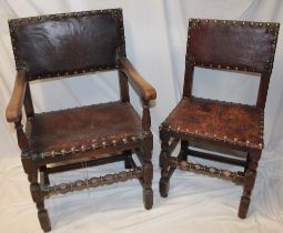 A pair of 19th century oak country-style dining chairs upholstered in leather on bobbin turned