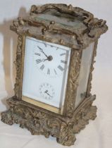An unusual French carriage clock with rectangular enamelled dial and repeating/striking movement in