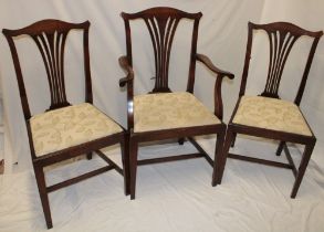 A set of four single and two carver Victorian beech Chippendale-style dining chairs with pierced