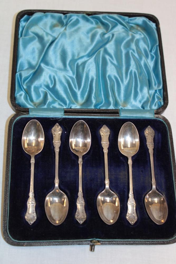 A set of six late Victorian silver teaspoons with decorated handles,