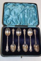 A set of six late Victorian silver teaspoons with decorated handles,