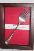 A Victorian silver-plated serving fork marked "S.S.