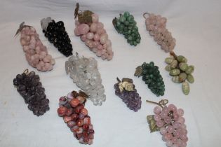 Twelve bunches of mineral and polished stone grapes including marble, onyx and others etc.