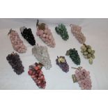 Twelve bunches of mineral and polished stone grapes including marble, onyx and others etc.