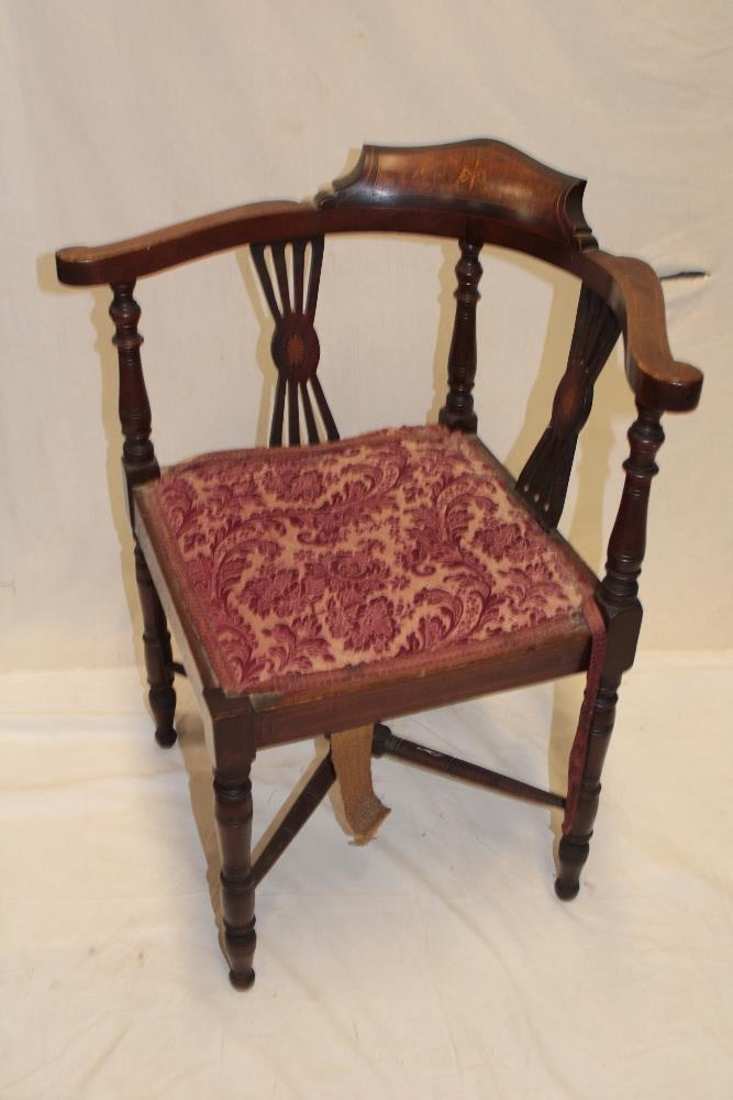 A Victorian inlaid mahogany corner occasional chair with upholstered seat on turned legs