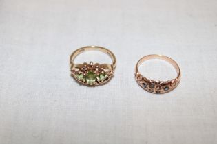 A 9ct gold dress ring set peridot and one other 9ct gold dress ring set sapphires and pearls (one