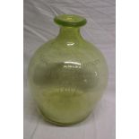 An unusual Georgian yellow tinted glass flask etched "Horse and Jockey Helstone 1817",